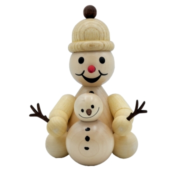 Junior sitzend mit Schneemann - mittel
