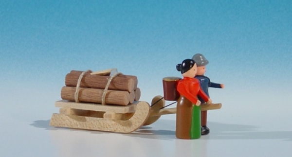 Handschlitten mit Waldarbeiter